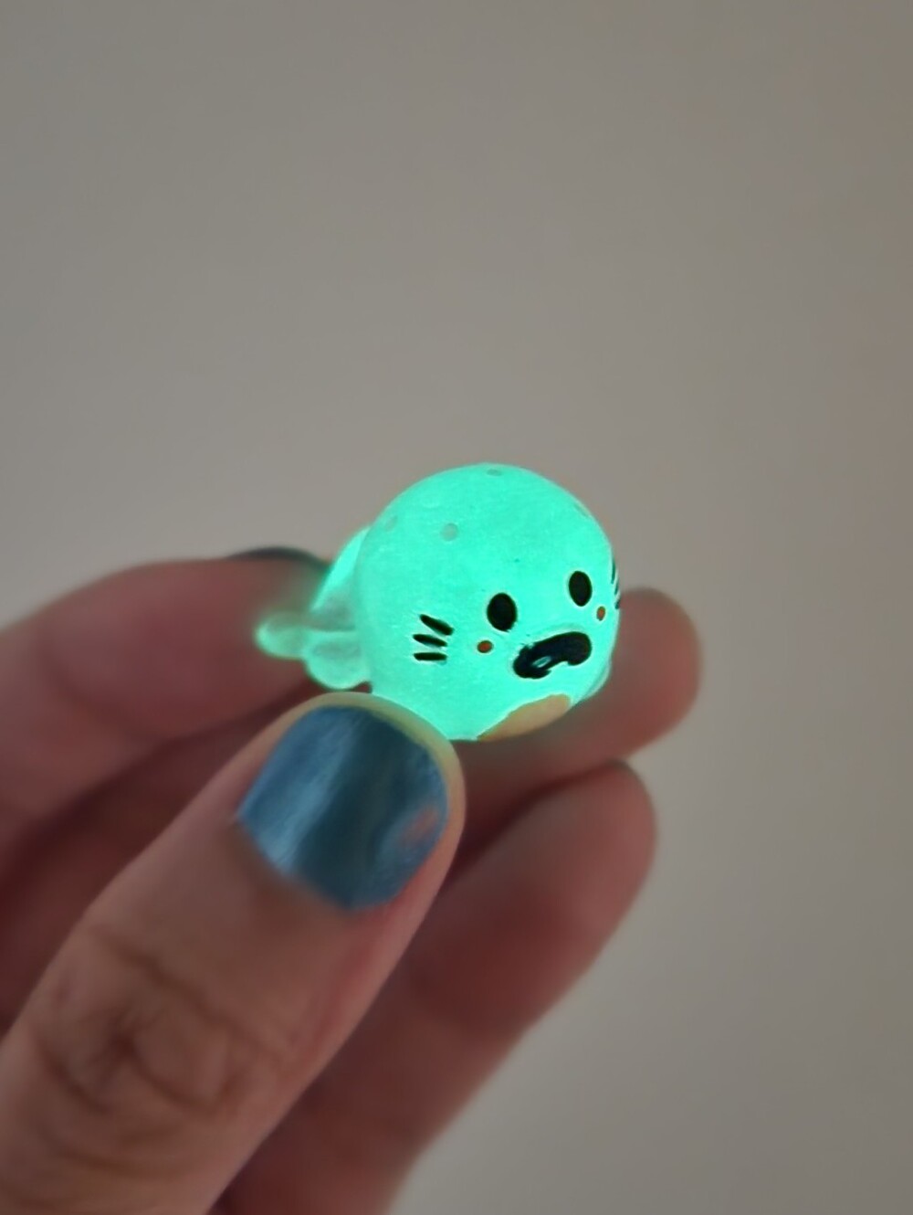 Cute little glow in the dark clear blue seal figure